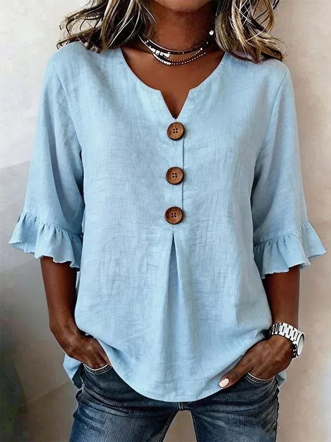 Chemisier femme polyvalent, col V boutonné, manches mi-longues, style fluide décontracté-chic pour toutes occasions.