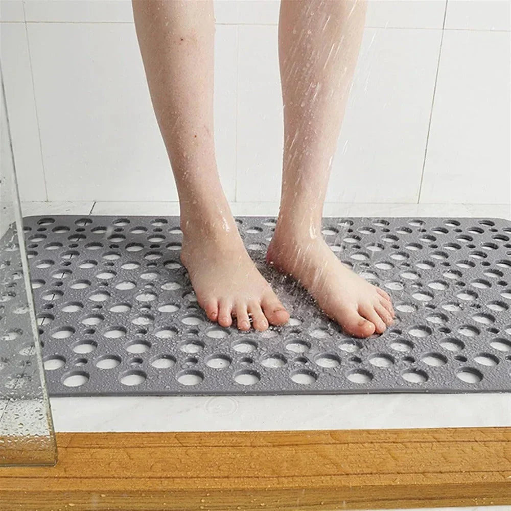 Tapis de douche antidérapant en PVC/TPE, assure sécurité et confort dans la salle de bain, prévient les glissades.