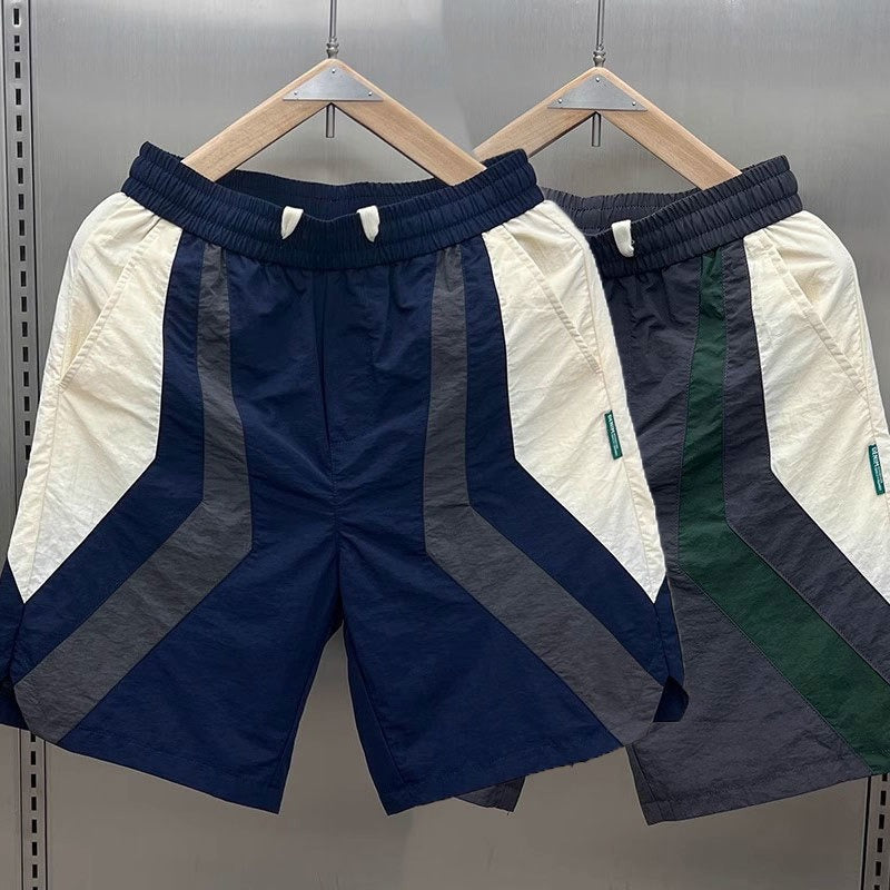 Short homme décontracté d'été à contraste, parfait pour le sport et le confort athlétique.