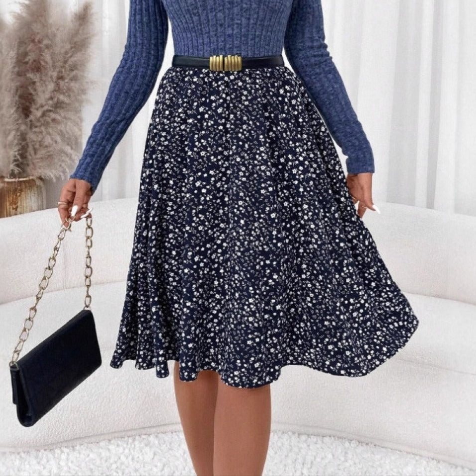 Jupe femme midi fleurie élégante, idéale pour le printemps et l'été, look chic et confortable.