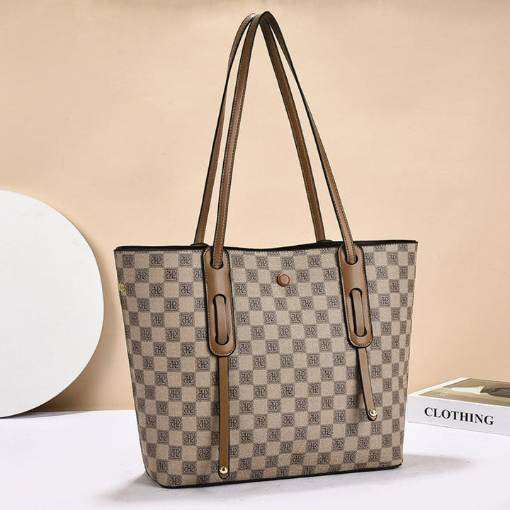 Sac à bandoulière femme jaune, design géométrique moderne. Accessoire tendance et fonctionnel.