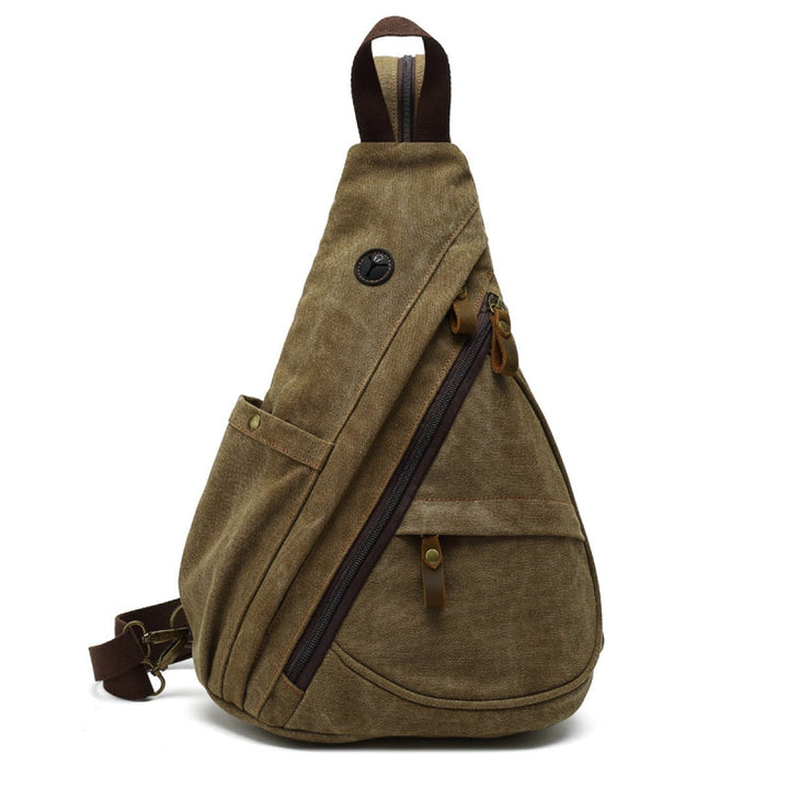Sac bandoulière vintage antivol unisexe en toile couleur café, idéal pour voyages et usage urbain. Robuste et sécurisé.