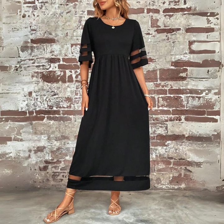 Robe d'été fluide élégante pour femme, style décontracté-chic, parfaite pour le printemps ou l'été.