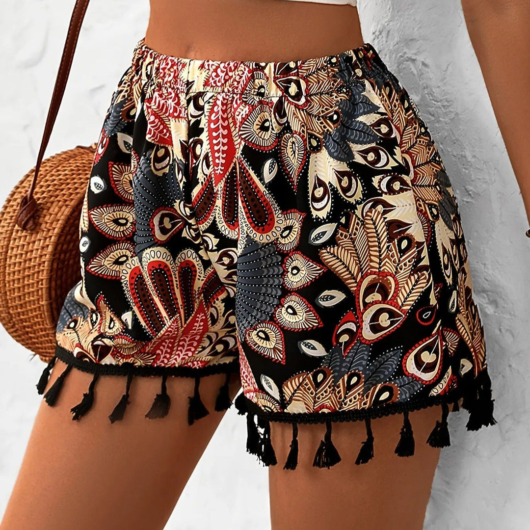 Short femme taille haute imprimé bohème, chic et décontracté avec pompons. Parfait pour la mode été et les vacances.