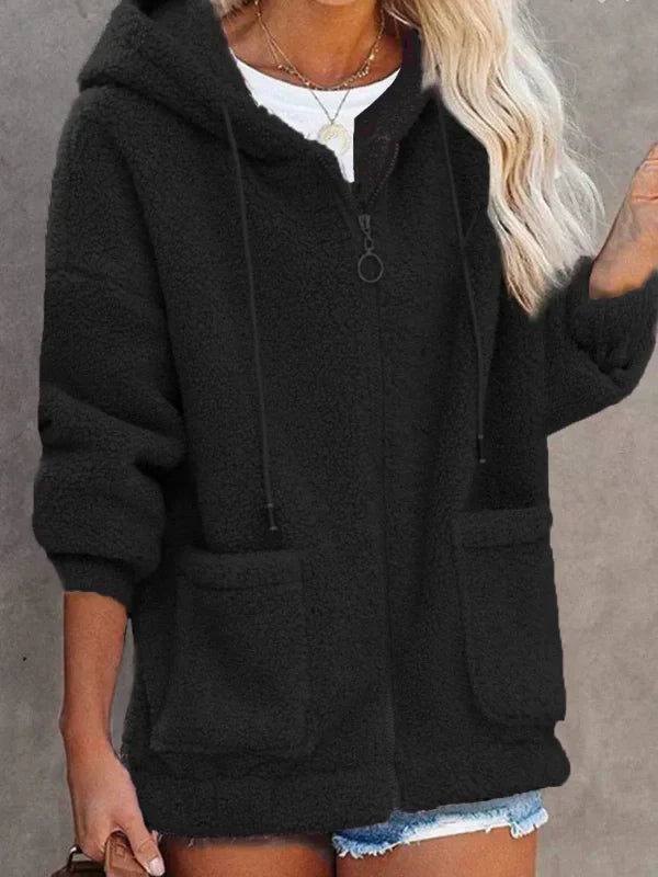 Vêtement femme chic: veste oversize décontractée à capuche avec fermeture éclair et grandes poches pour hiver.