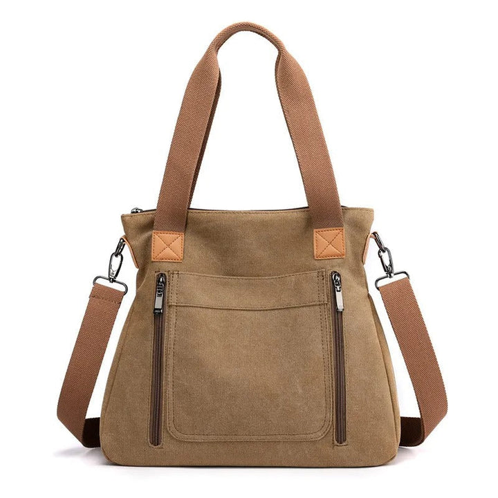 Sac fourre-tout décontracté pour femme en toile robuste, spacieux et chic, parfait pour toute occasion.