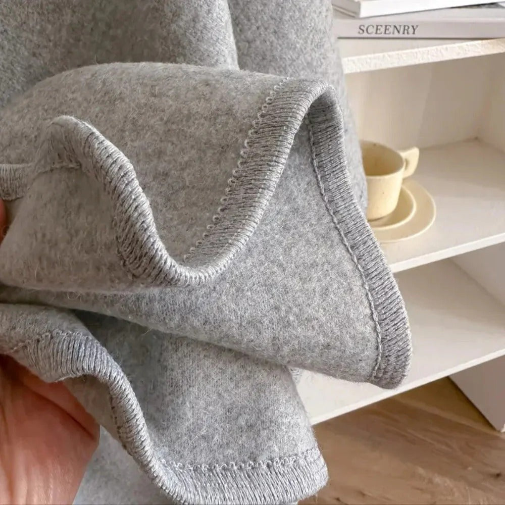 Poncho écharpe femme confortable et chic, l'accessoire parfait pour rester au chaud avec mode.