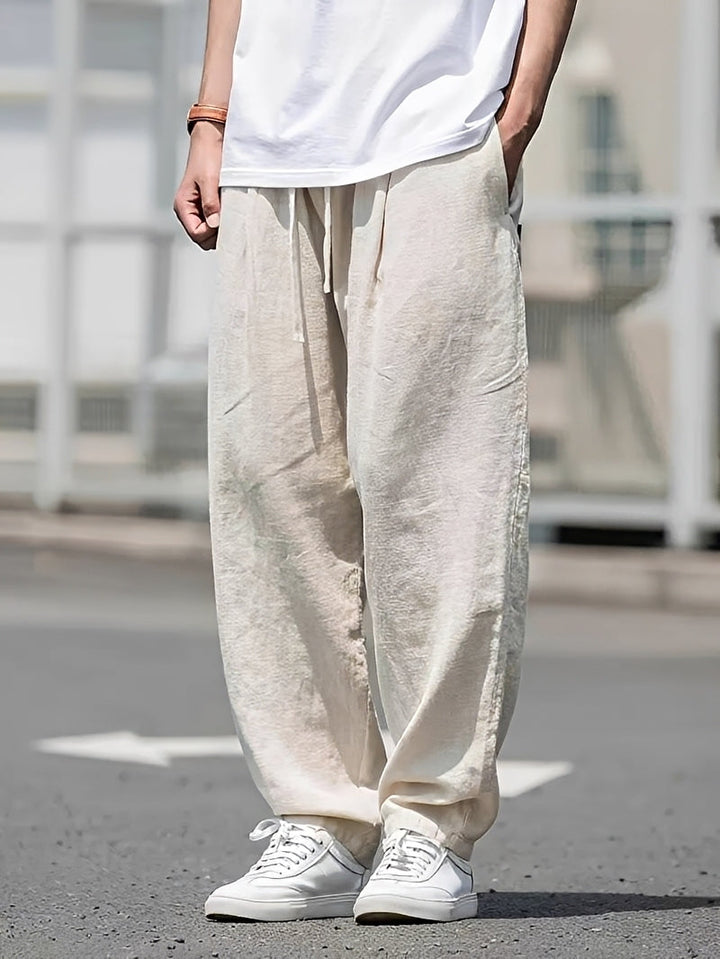 Pantalon homme ample et confortable, style décontracté. Idéal pour le quotidien, loisirs et vacances d'été.