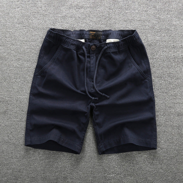 Short cargo camouflage pour homme, idéal pour l'été. Confort et poches pratiques pour un style décontracté.