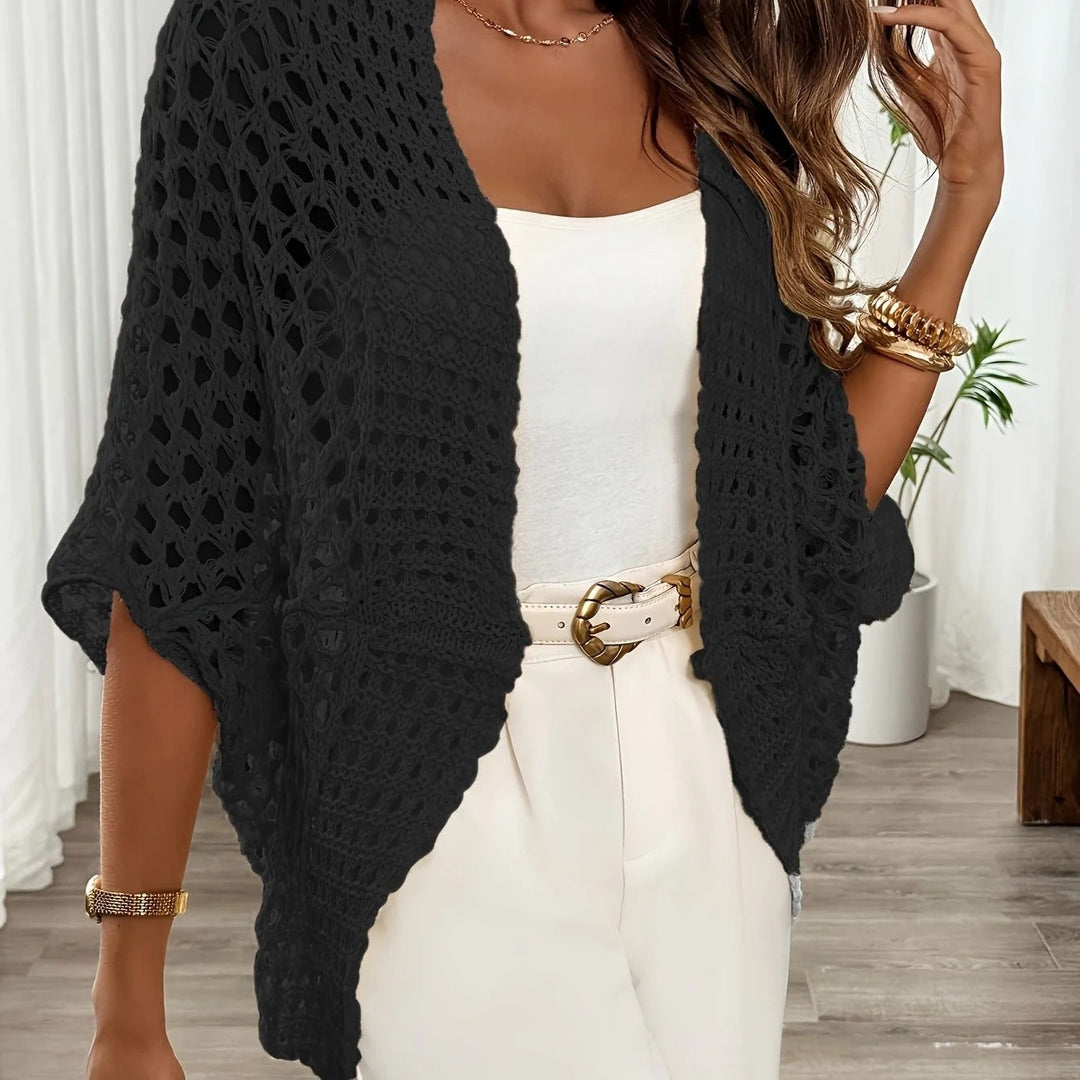 Cardigan femme mode, coupe légère pour un style chic et moderne. Parfait en superposition pour le printemps/automne.