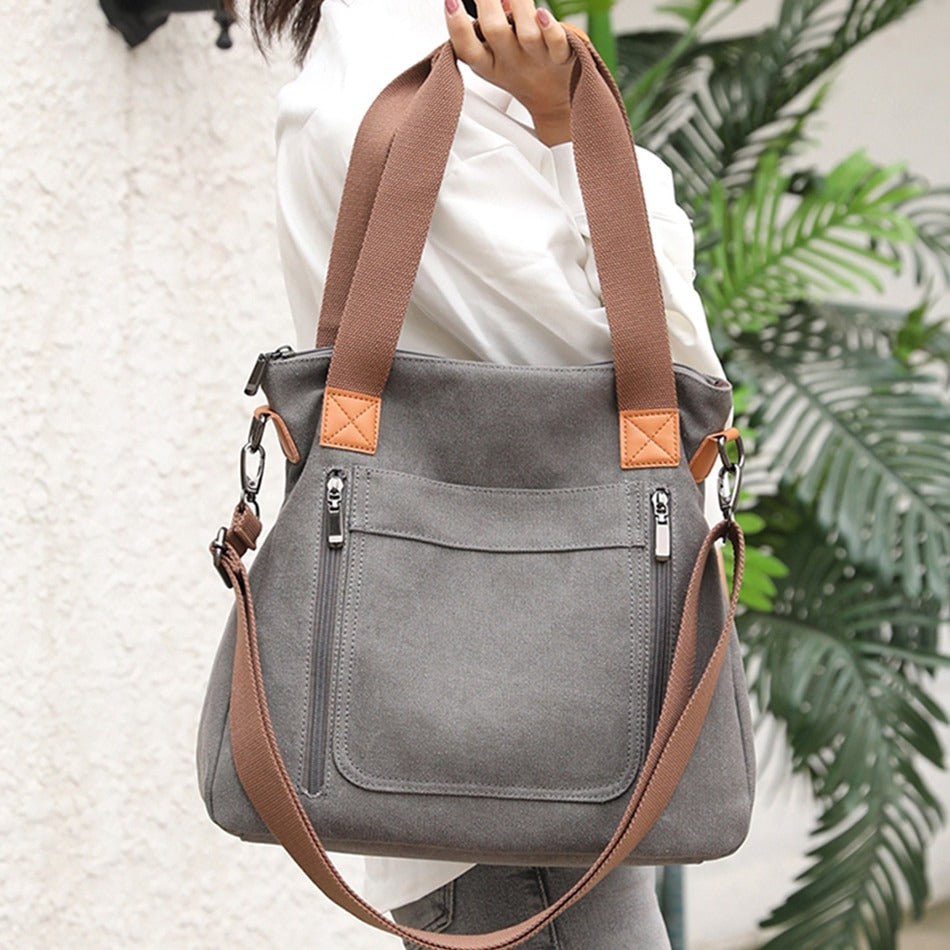 Sac fourre-tout femme en toile robuste, style décontracté et élégant, parfait pour le quotidien.