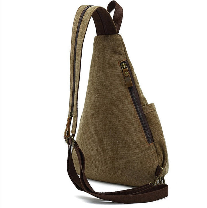Sac à dos bandoulière antivol robuste en toile pour homme et femme, style décontracté pour voyage urbain et sécurité.