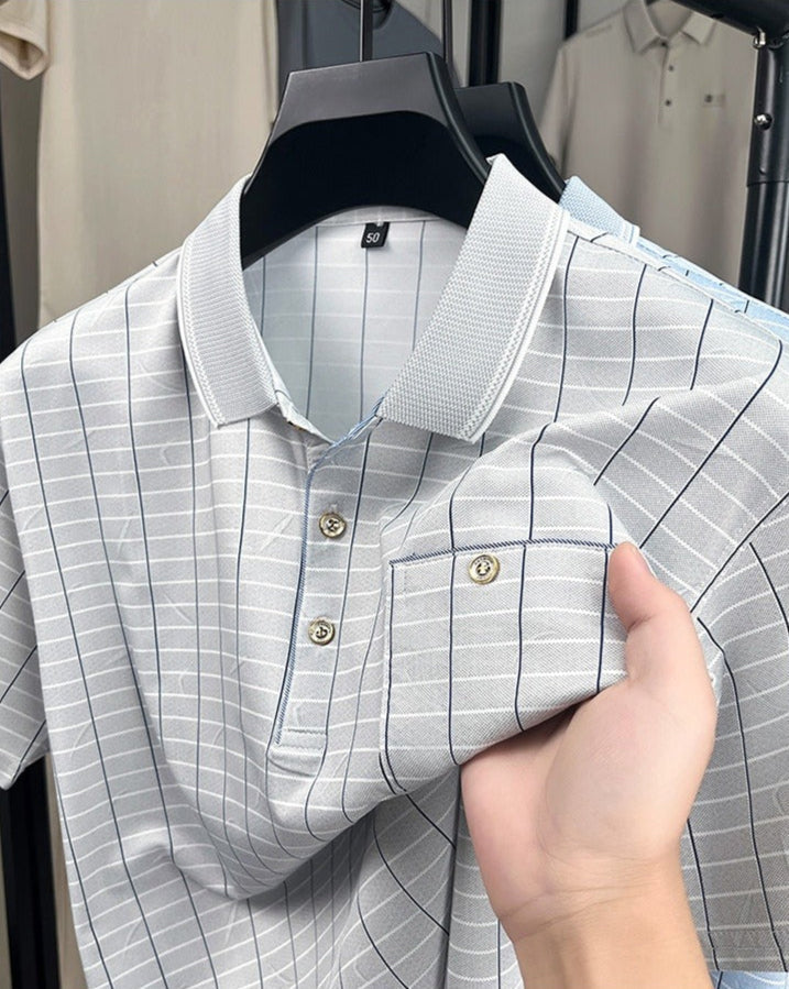 Polo élégant et décontracté pour homme. Tissu respirant, manche courte et poche. Un incontournable de la mode estivale.