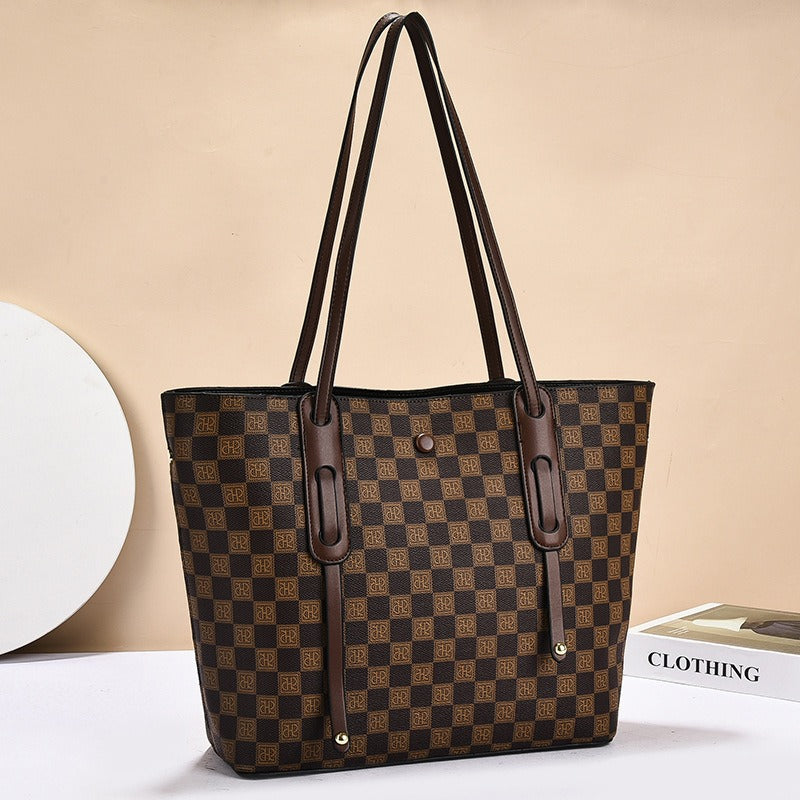 Sac à bandoulière géométrique pour femme, idéal pour le quotidien. Design tendance et polyvalent.