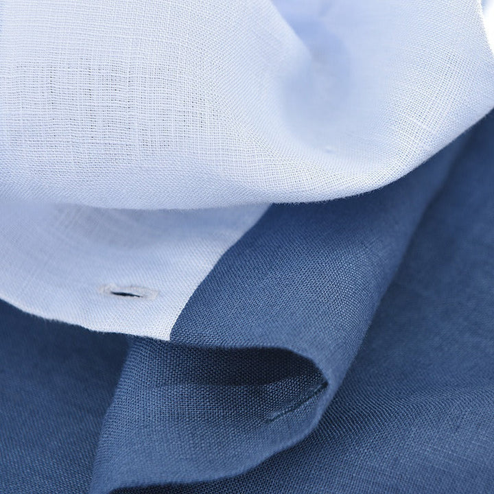 Chemise homme décontractée aux couleurs vives, manches courtes, idéale pour la chaleur estivale.