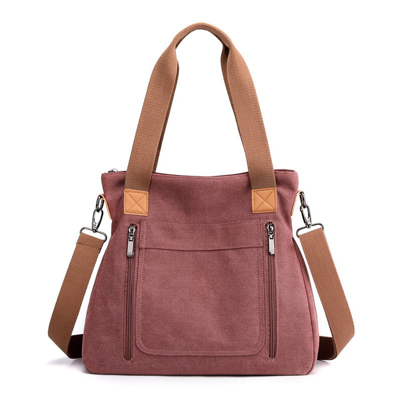 Sac fourre-tout en toile robuste pour femme, grand et polyvalent, idéal pour le travail, shopping ou voyage.