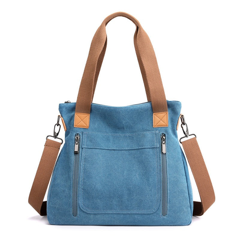 Sac en toile femme grand format, polyvalent et résistant, idéal comme sac de voyage ou pour le quotidien.