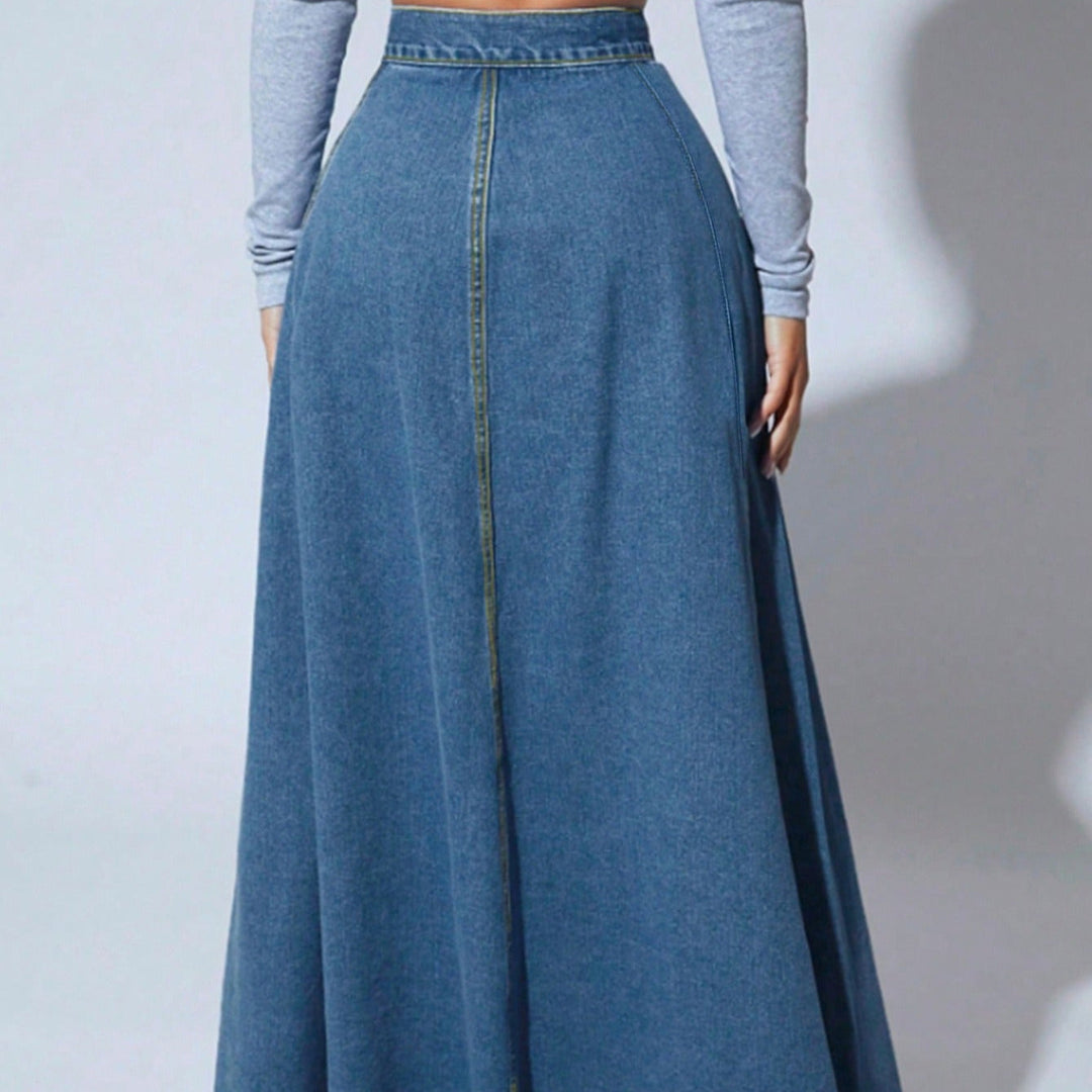 Silhouette de femme portant une jupe longue taille haute à boutons, élégante et polyvalente, mode intemporelle.
