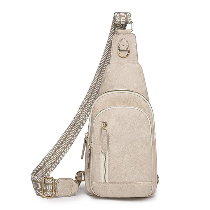 Sac bandoulière femme compact en cuir synthétique avec compartiments pour une bonne organisation.