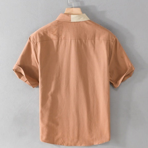 Chemise décontractée homme à motif patchwork, manches courtes, idéale pour un look estival confortable.