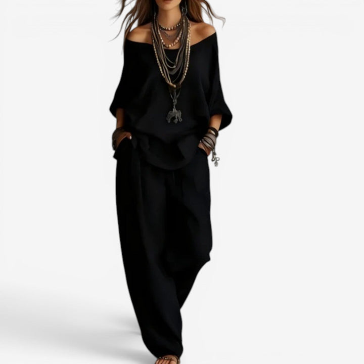 Tenue de voyage bohème chic pour femme: ensemble fluide, tunique à épaules dénudées et pantalon. Confort estival.