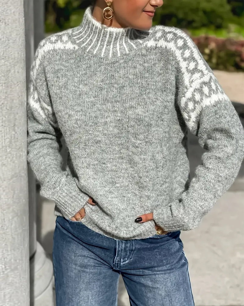 Pull femme tendance en tricot gaufré, look hivernal chic et douillet.