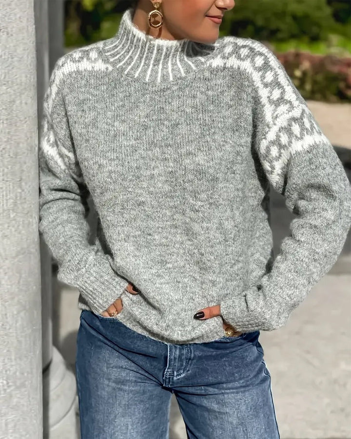 Pull femme tendance en tricot gaufré, look hivernal chic et douillet.