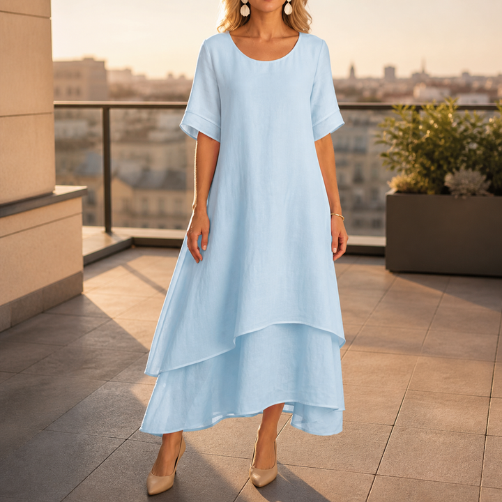 Robe femme midi fluide, coupe flatteuse, parfaite pour cérémonie, mariage, soirée. Mode chic.