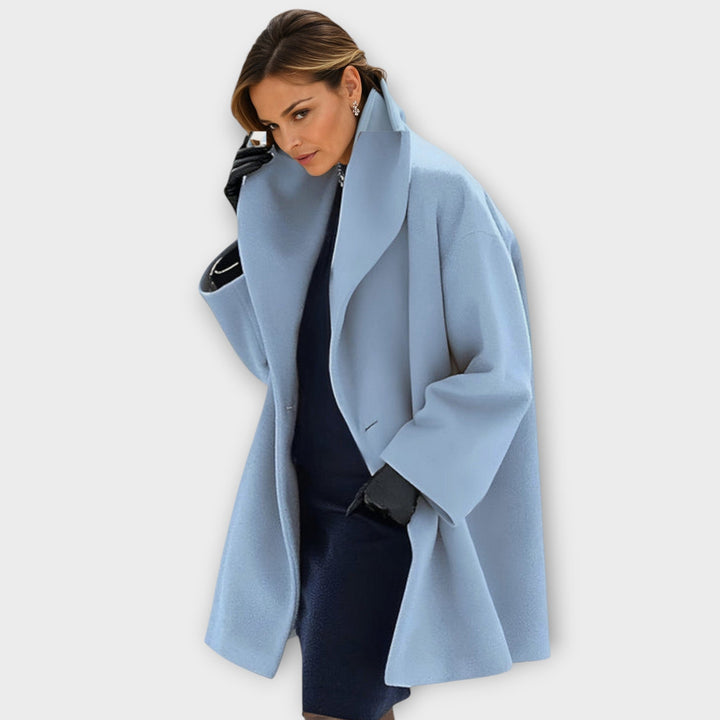 Veste longue coupe-vent femme, chaude et confortable, parfaite pour l'hiver et la mode urbaine.