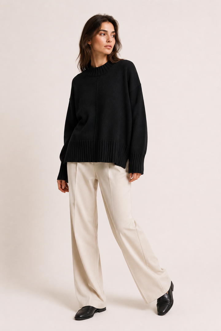 Pull femme décontracté oversize, col montant, ourlet asymétrique. Chaleur et style pour l'hiver.