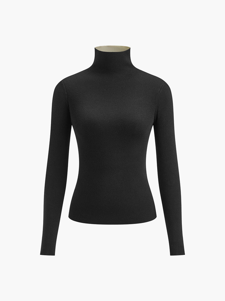 Pull noir côtelé à col roulé pour femmes, design élégant et coupe ajustée. Un essentiel douillet pour la saison froide.