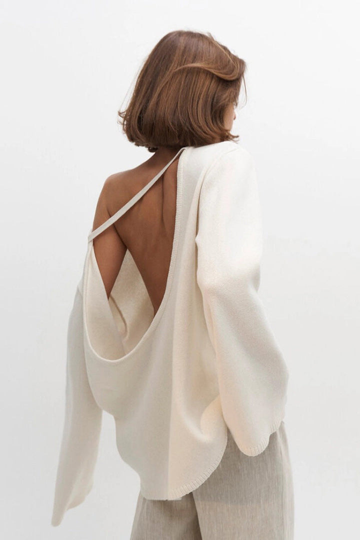 Pull oversize doux à manches longues pour femme, parfait pour un style chic et confortable en automne.