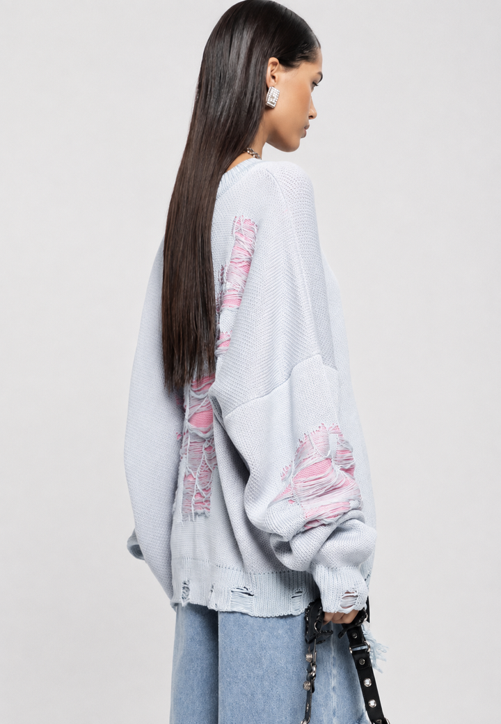 Chandail maille ouverte femme, style effiloché et oversize. Confortable pour l'automne.