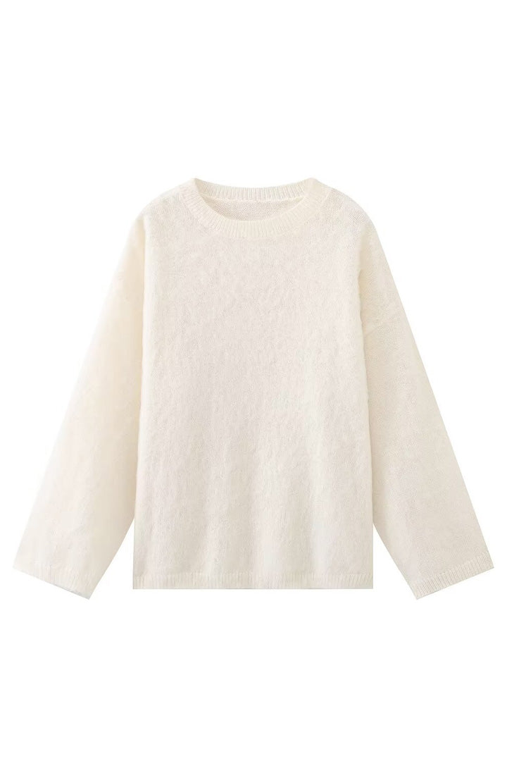 Pull femme décontracté chic, coupe oversize confortable, col rond, épaules tombantes, automne/hiver.