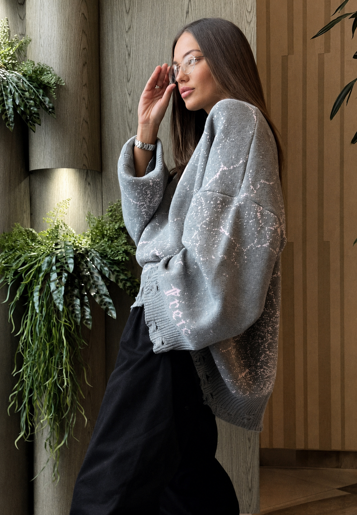 Pull décontracté chic femme, manches longues, graphique, déchiré, parfait pour le quotidien.