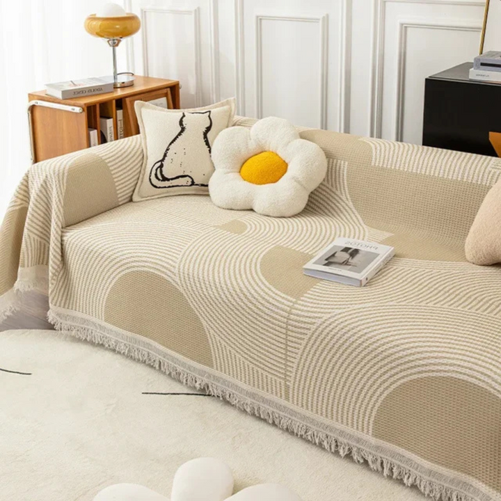Protection canapé: jeté scandinave à franges, parfait pour ajouter chaleur et style nordique à votre espace de vie.