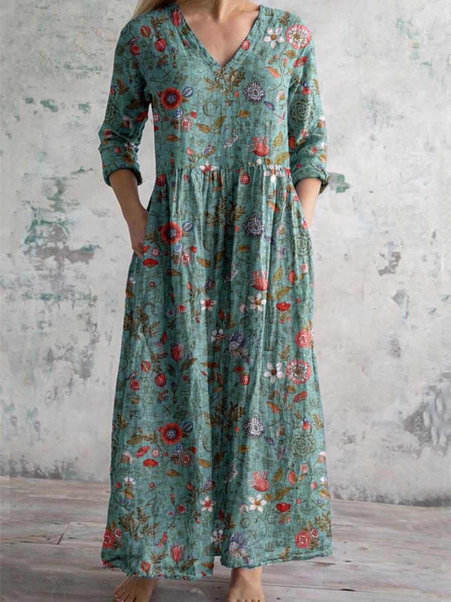 Modèle de robe fleurie femme élégante, col V. Motif floral délicat, idéale pour l'été et les invités de mariage.