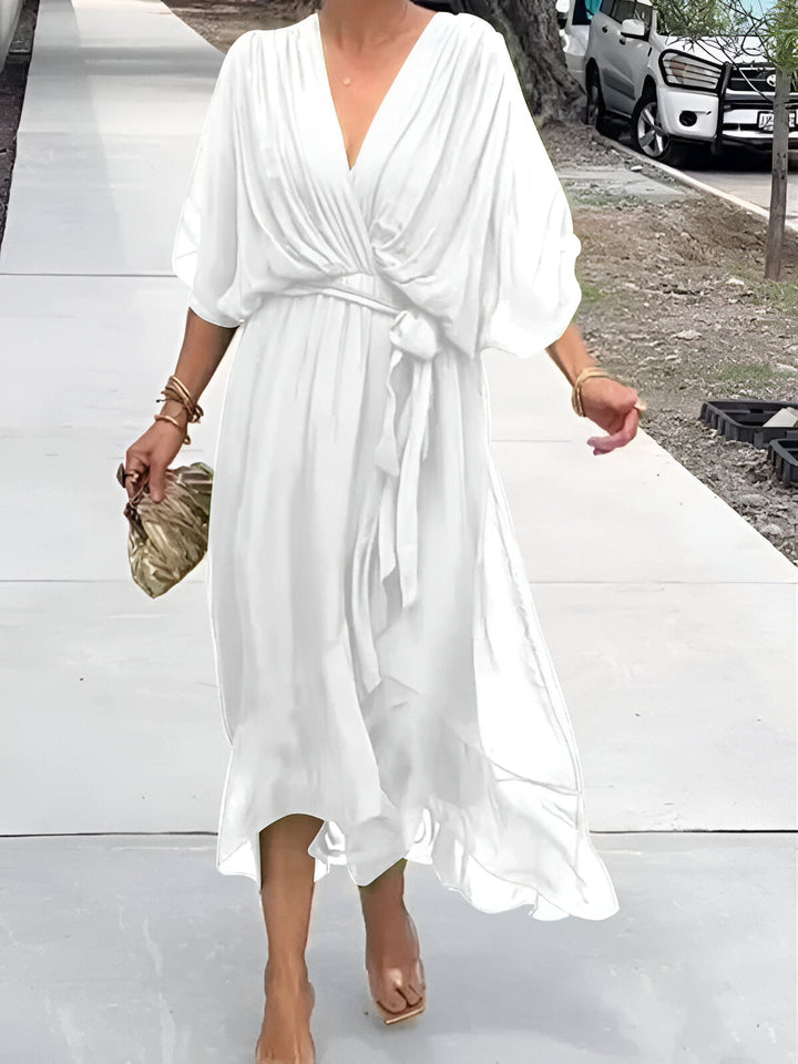 Robe chic femme, col V, coupe fluide, pour un look estival ou une soirée spéciale, très confortable.
