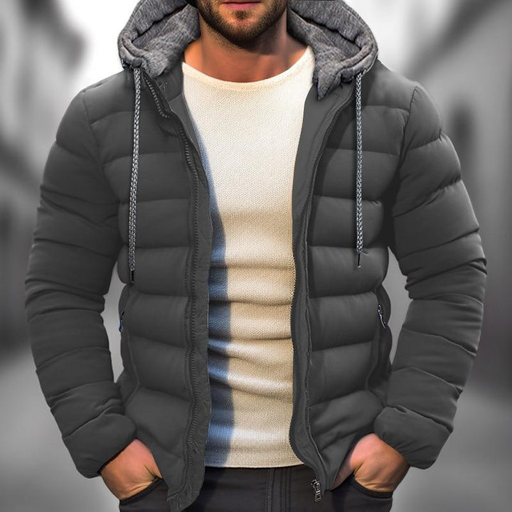 Confortable veste homme matelassée avec capuche pour l'hiver, parfaite pour le quotidien et le plein air.