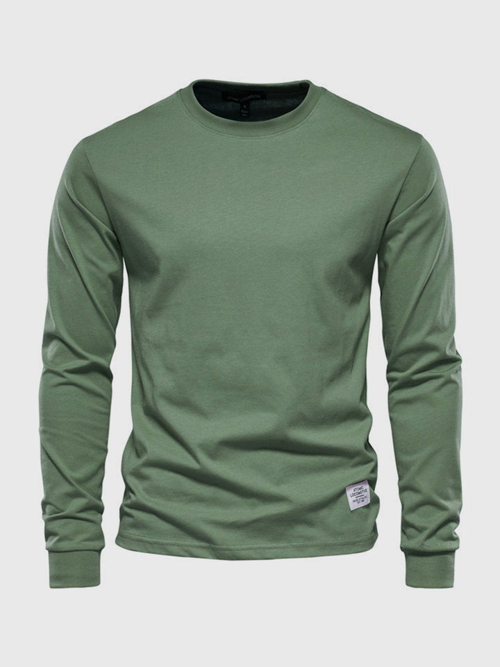 Vêtement homme décontracté, t-shirt manches longues col rond, essentiel pour garde-robe casual et tendance.
