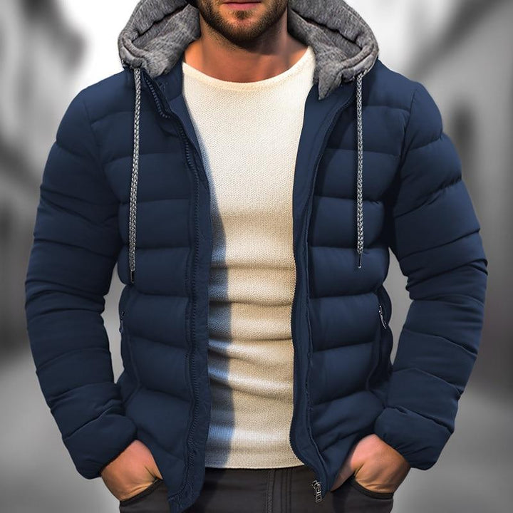 Doudoune chaude pour homme, matelassée et à capuche, parfaite pour les activités de plein air en hiver.