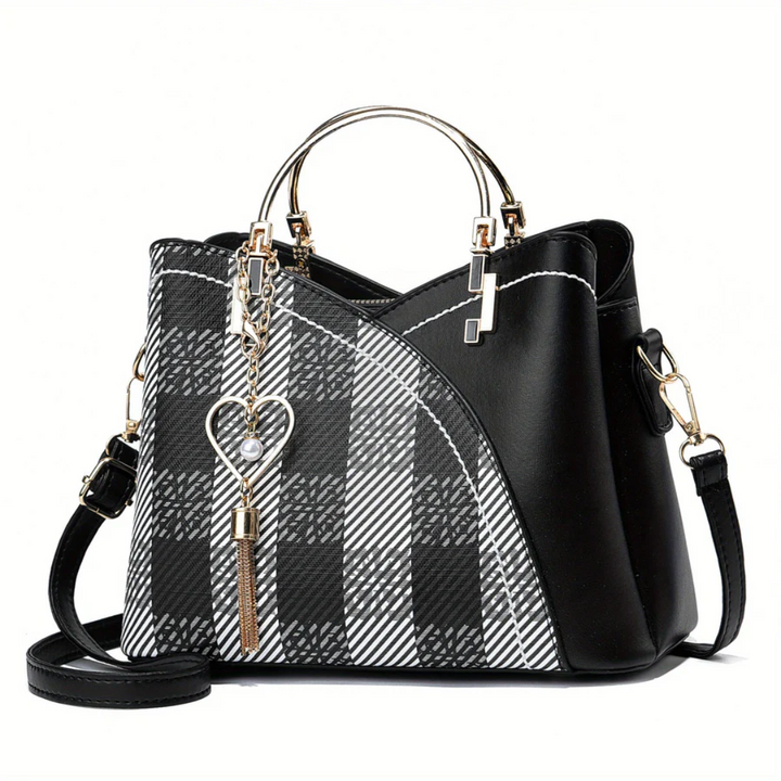 Sac à main élégant pour femmes, style épuré, parfait pour compléter une tenue de ville.