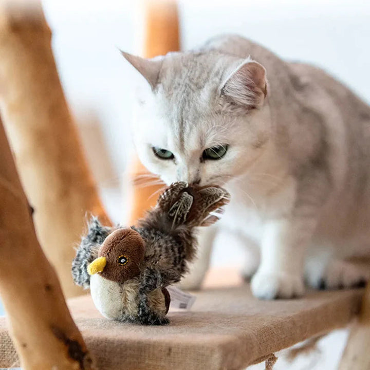 Jouet interactif pour chat avec plumes et sons réalistes. Stimule l'instinct de chasse du félin.