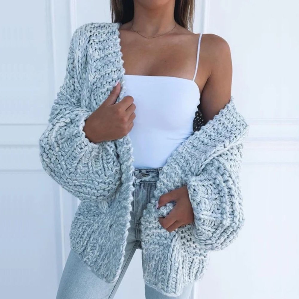 Cardigan femme élégant couleur unie, parfait pour une tenue chic ou décontractée. Confortable et tendance.