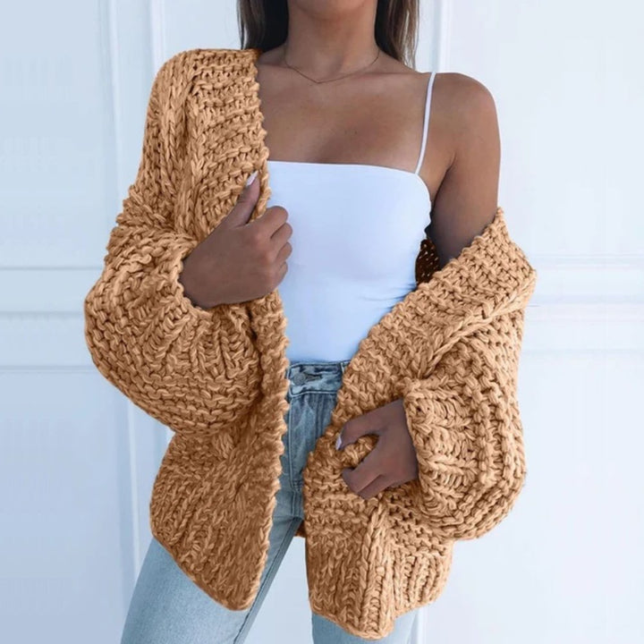 Cardigan femme chic et polyvalent, apporte confort et style à votre mode féminine. Idéal pour toute occasion.