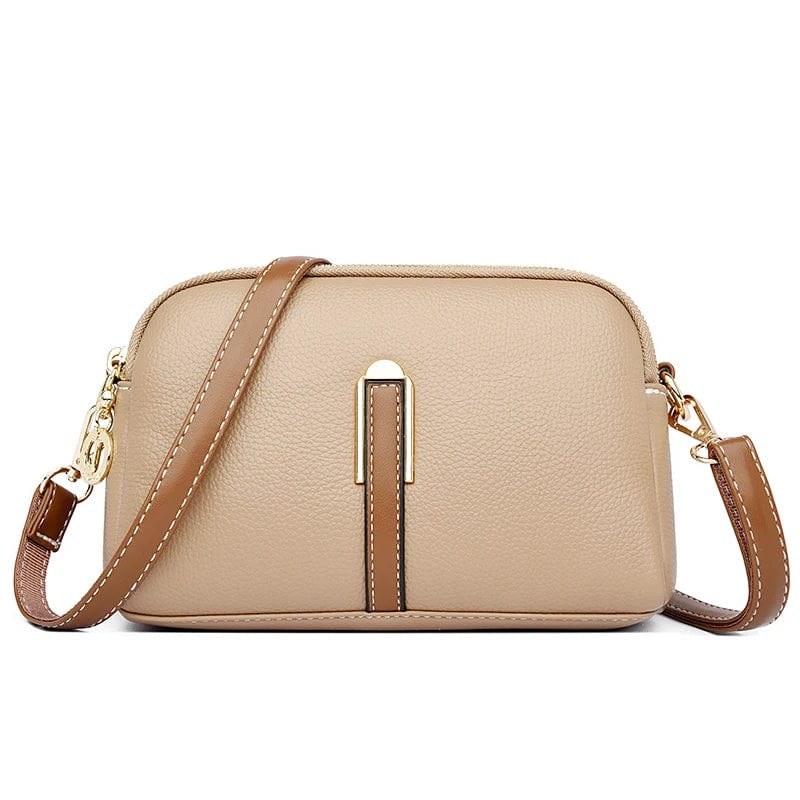 Sac à main femme élégant en cuir vegan noir, style chic avec bandoulière réglable.
