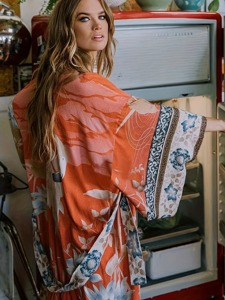 Kimono léger femme en coton orange sanguine, coupe fluide, parfait pour la détente et l'été chic.