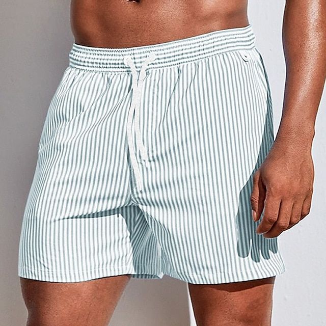 Short de bain homme à rayures, séchage rapide pour plage et piscine. Léger et confortable pour l'été.