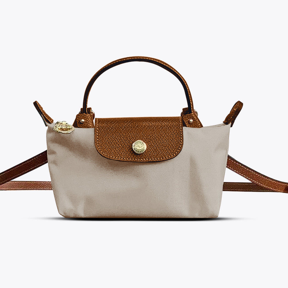 Mini sac bandoulière femme, compact et pratique, parfait pour transporter l'essentiel avec style.