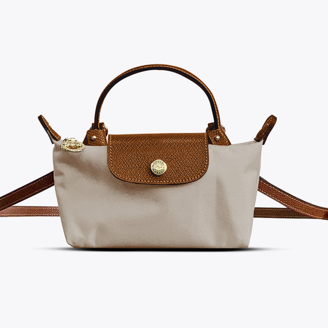 Mini sac bandoulière femme, compact et pratique, parfait pour transporter l'essentiel avec style.